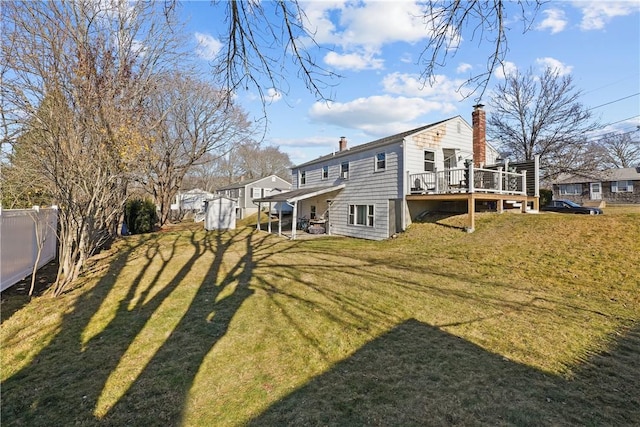 view of yard with a wooden deck