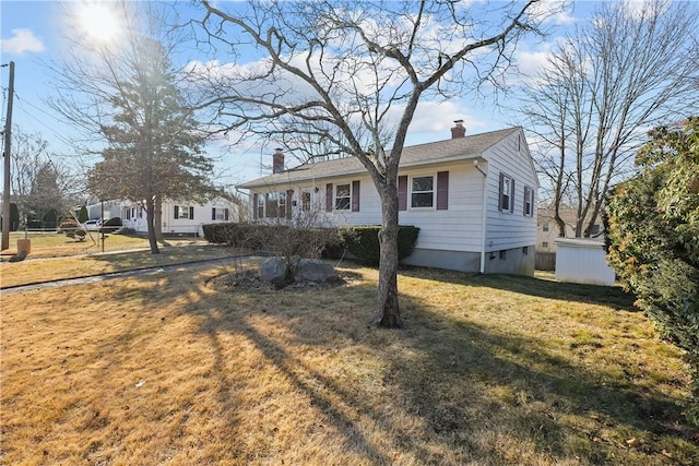 view of front facade with a front lawn