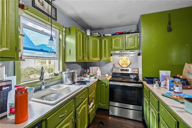 kitchen featuring dark hardwood / wood-style flooring, electric range, sink, and a textured ceiling