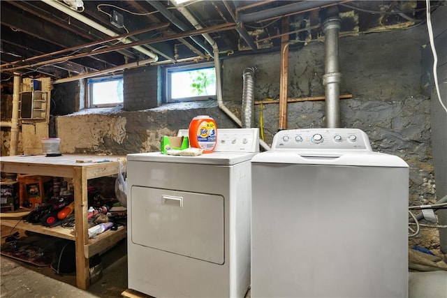 washroom featuring washing machine and dryer