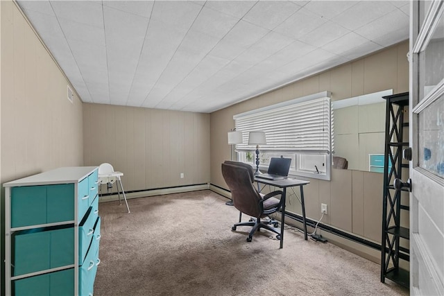 carpeted office featuring wooden walls