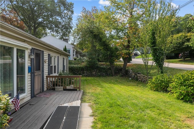 view of yard featuring a deck