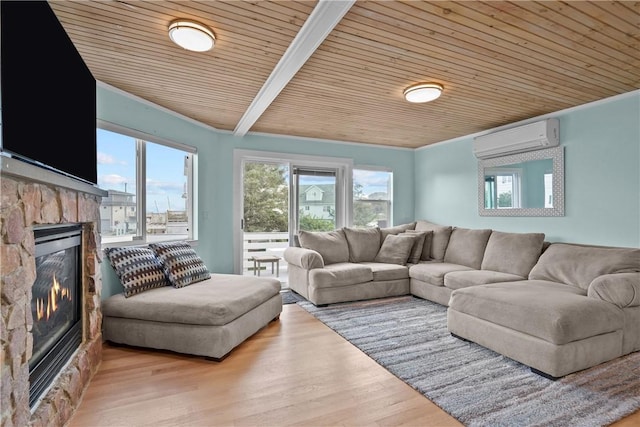 living room featuring light hardwood / wood-style floors, wooden ceiling, a fireplace, and an AC wall unit