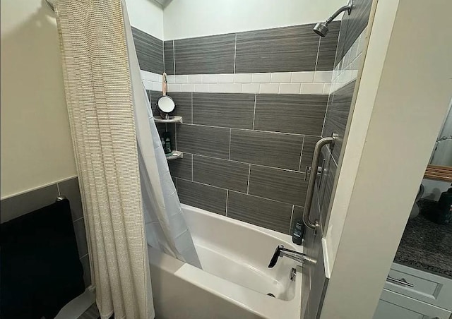 bathroom featuring shower / bathtub combination with curtain