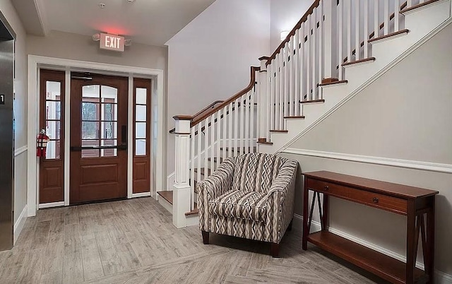 entrance foyer featuring light hardwood / wood-style floors