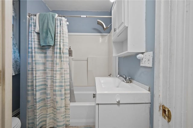 full bathroom with shower / bath combo, toilet, and vanity