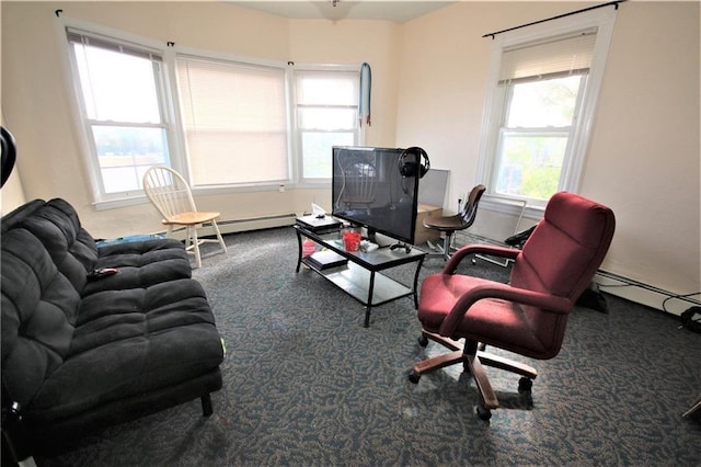 carpeted living room with a baseboard radiator