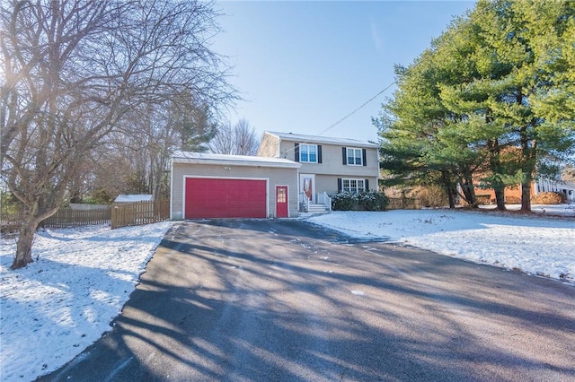 view of front of property with a garage