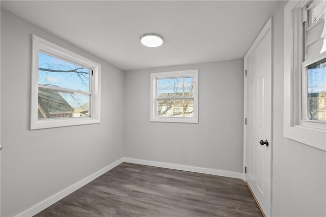 empty room featuring dark hardwood / wood-style floors