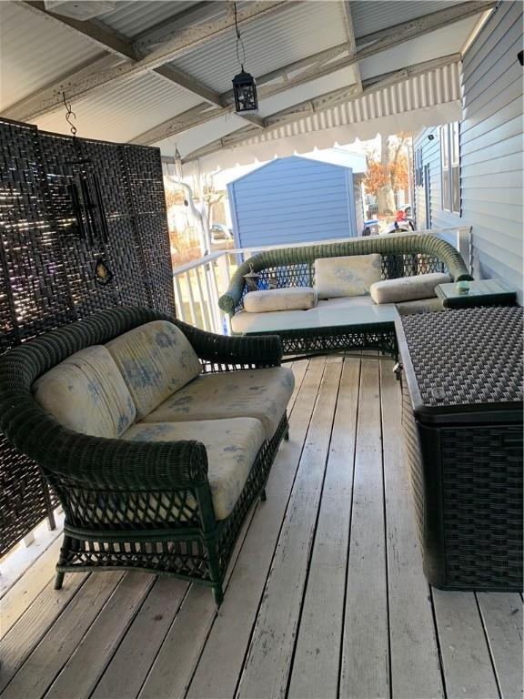 balcony featuring outdoor lounge area and a porch