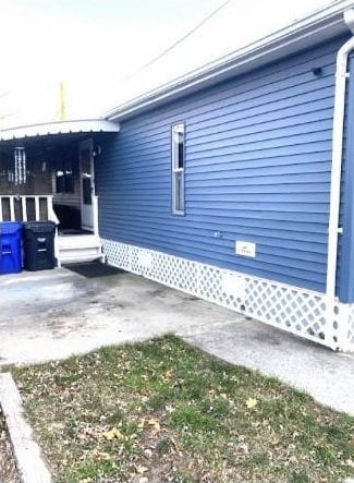 view of home's exterior with driveway