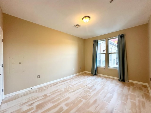 empty room featuring light hardwood / wood-style floors