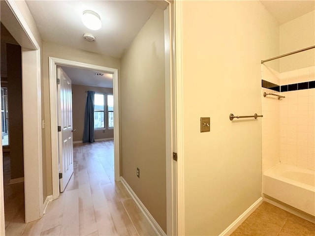 hallway featuring light hardwood / wood-style floors