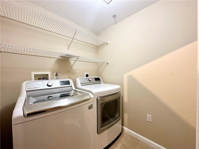 laundry room featuring washer and dryer