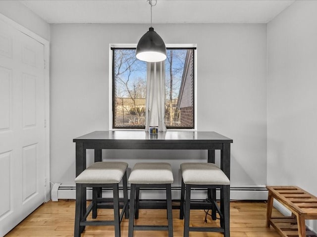 dining space featuring light hardwood / wood-style flooring