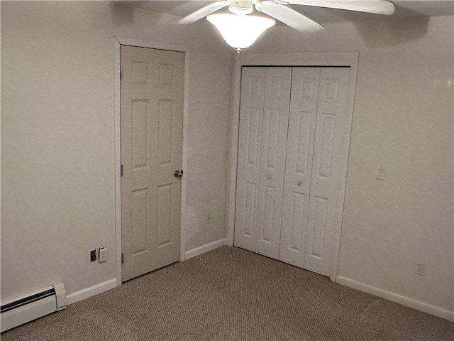 unfurnished bedroom with carpet flooring, ceiling fan, a closet, and a baseboard radiator