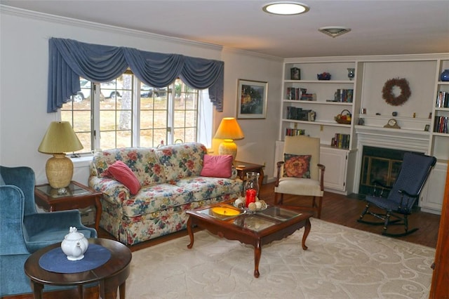 living room featuring a fireplace with flush hearth and wood finished floors