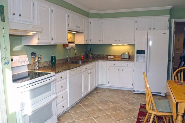 kitchen with crown molding, under cabinet range hood, white appliances, white cabinetry, and a sink