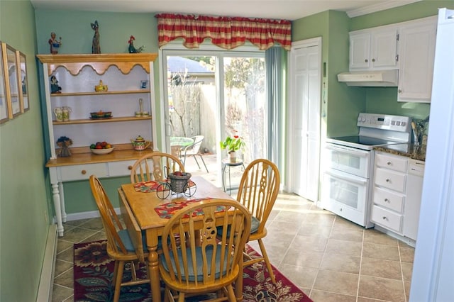 dining space with light tile patterned flooring