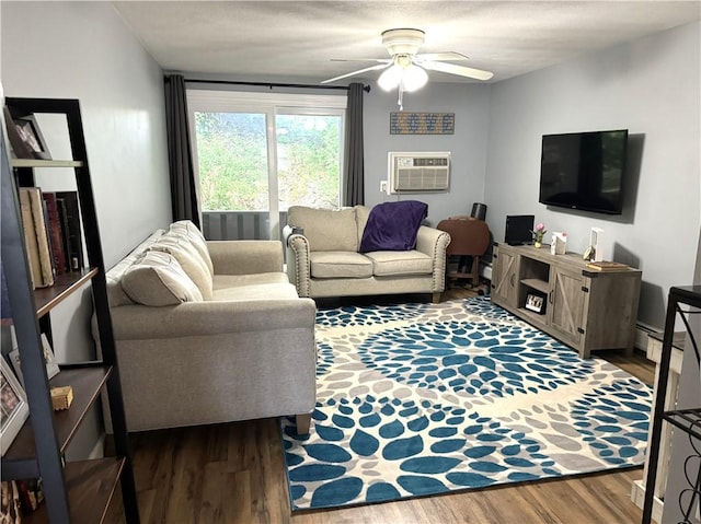 living room featuring baseboard heating, ceiling fan, a wall mounted air conditioner, and hardwood / wood-style flooring