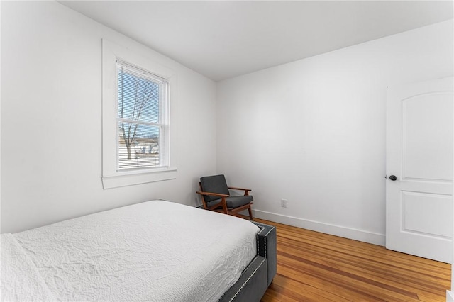 bedroom featuring hardwood / wood-style floors