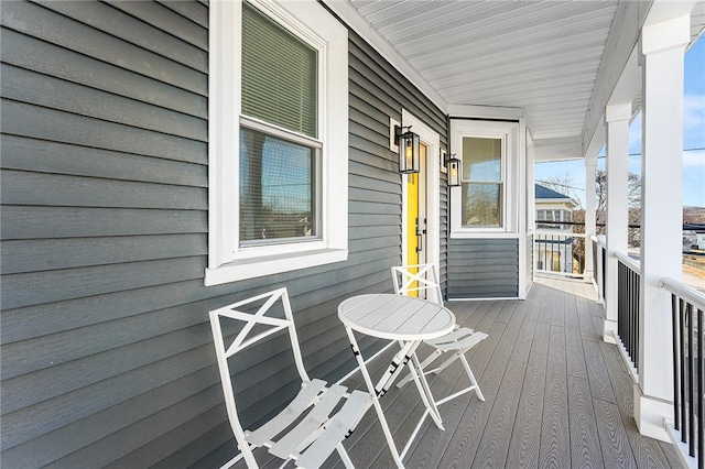 wooden deck featuring a porch