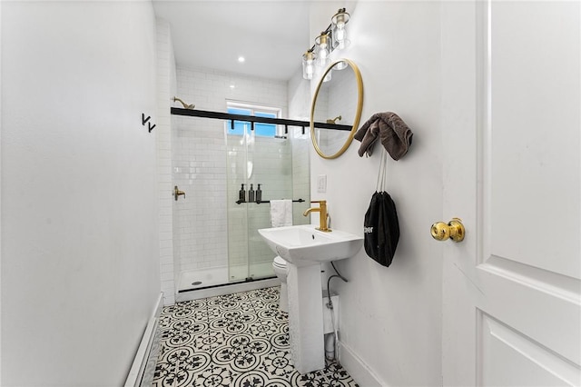 bathroom with tile patterned flooring and walk in shower