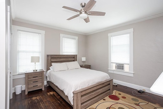 bedroom featuring dark hardwood / wood-style flooring, cooling unit, ceiling fan, and crown molding