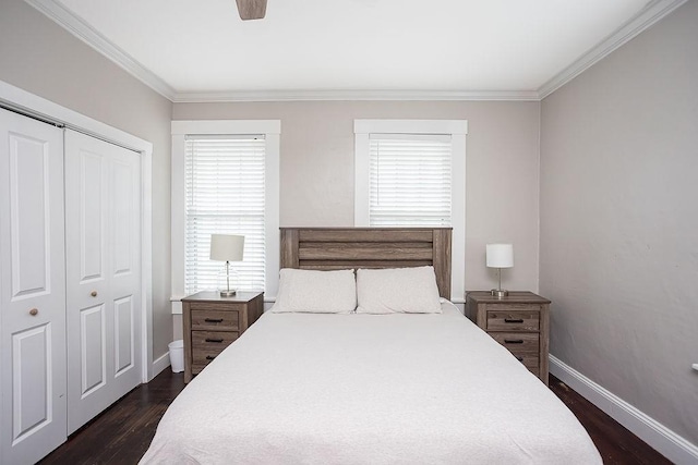 bedroom featuring ceiling fan, multiple windows, and a closet