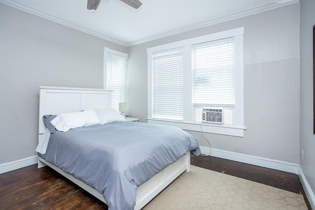 bedroom with ceiling fan, cooling unit, dark wood-type flooring, and ornamental molding