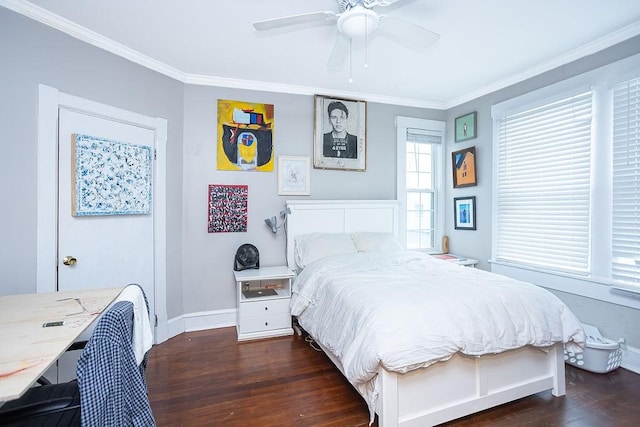 bedroom featuring dark hardwood / wood-style floors, ceiling fan, and crown molding