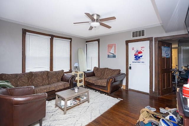 living room featuring ceiling fan, dark hardwood / wood-style flooring, and ornamental molding