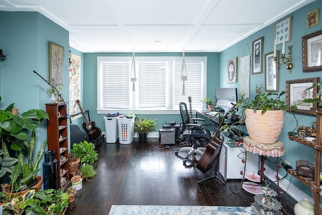 office space featuring ornamental molding, dark wood-type flooring, and coffered ceiling