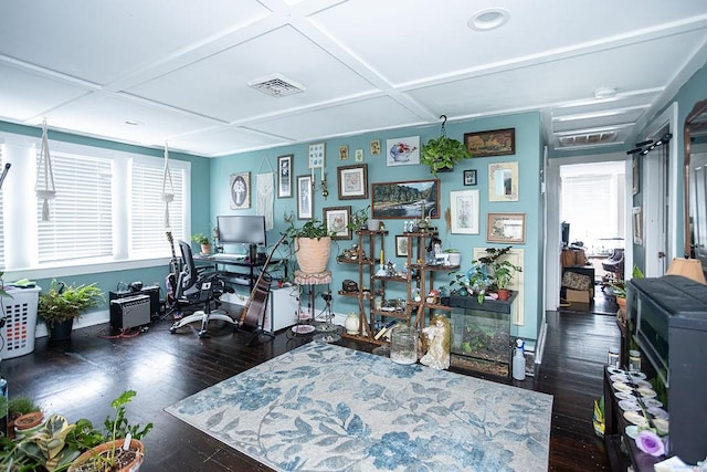 home office with dark wood-type flooring and coffered ceiling