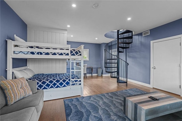 bedroom featuring wood-type flooring