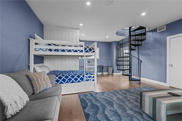 bedroom featuring hardwood / wood-style flooring