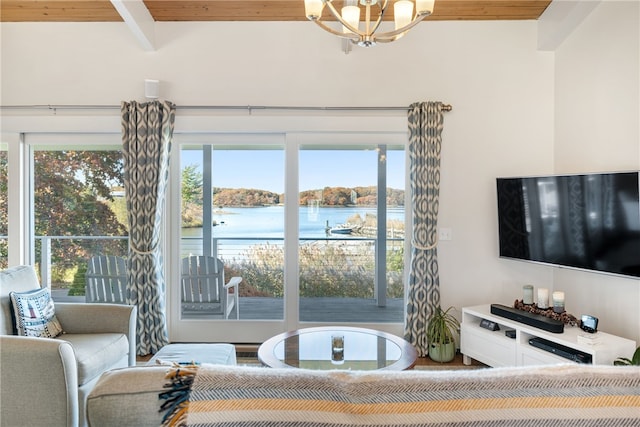 living room featuring beamed ceiling, a notable chandelier, and wood ceiling