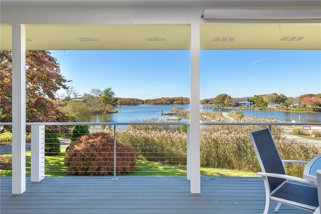 deck featuring a water view