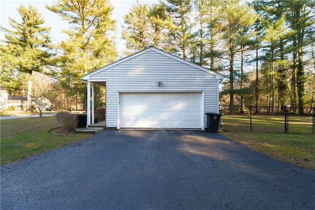 garage with a lawn