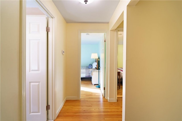 corridor featuring light wood-type flooring