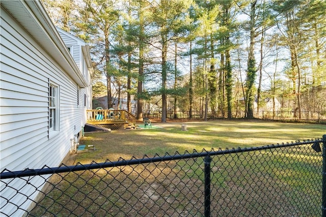 view of yard with a deck