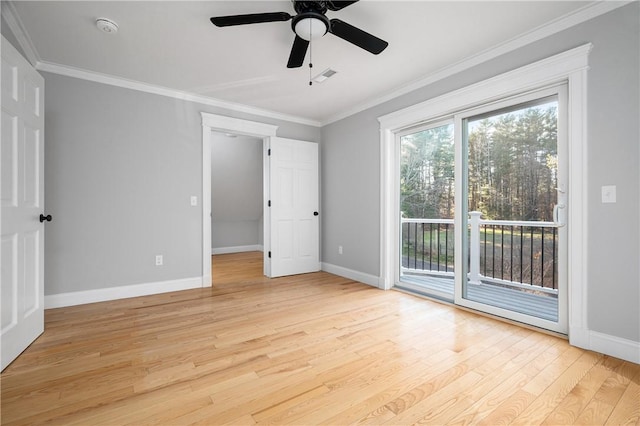 spare room with ceiling fan, light hardwood / wood-style floors, and ornamental molding