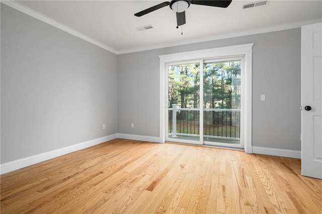 spare room with light wood-type flooring, ceiling fan, and ornamental molding