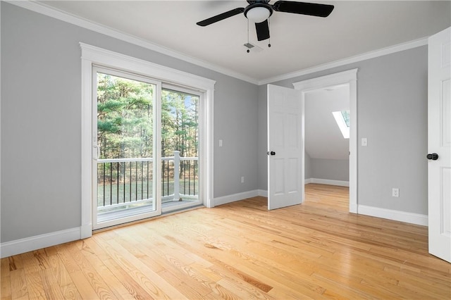 unfurnished room with crown molding, light hardwood / wood-style flooring, and ceiling fan