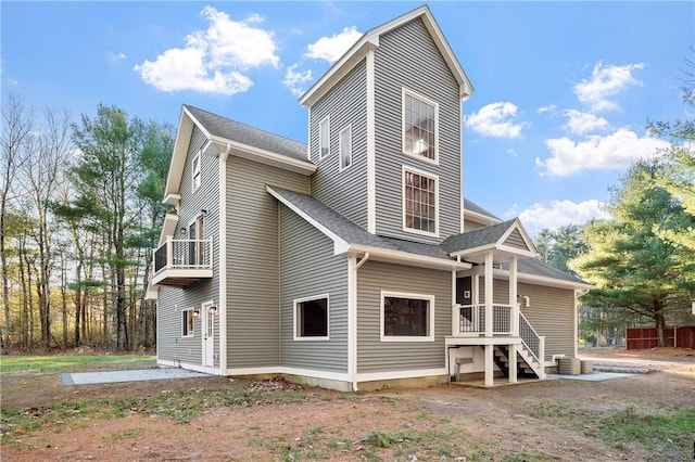 view of property exterior with a patio and cooling unit