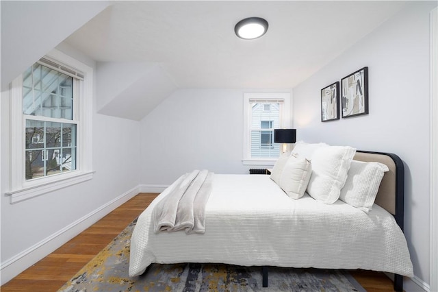 bedroom featuring wood-type flooring