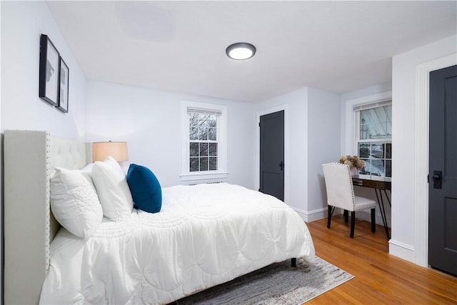 bedroom featuring hardwood / wood-style flooring