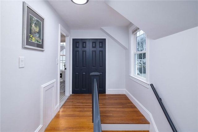 foyer entrance with hardwood / wood-style flooring