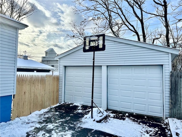 view of snow covered garage