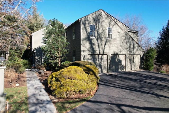 view of home's exterior featuring a garage